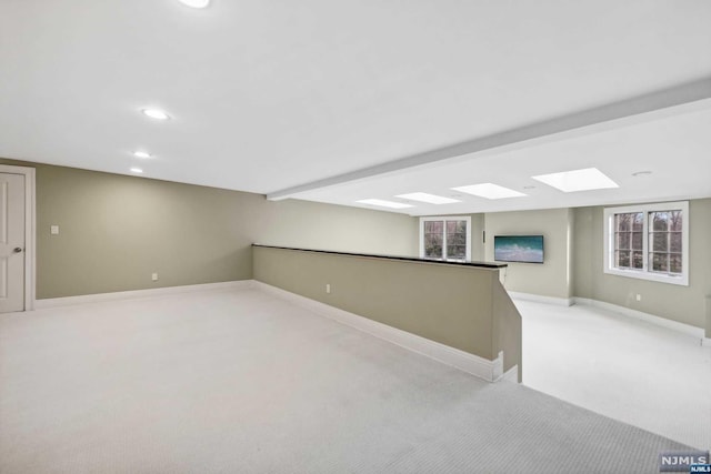 basement with light colored carpet