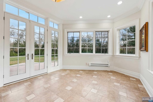 unfurnished sunroom with baseboard heating and french doors