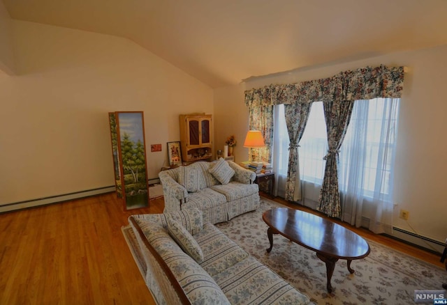 living room featuring hardwood / wood-style floors and lofted ceiling