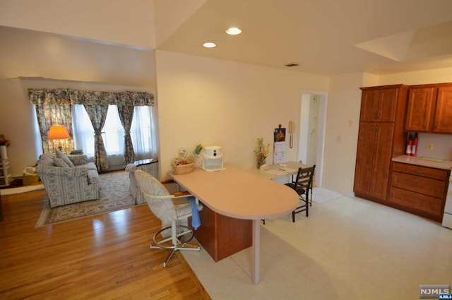 dining space featuring light hardwood / wood-style flooring