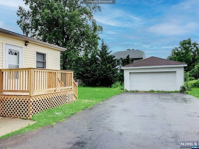 garage with a yard