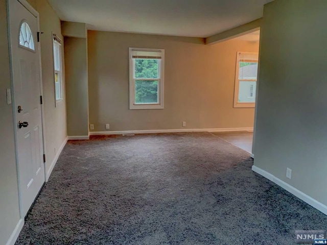 view of carpeted spare room