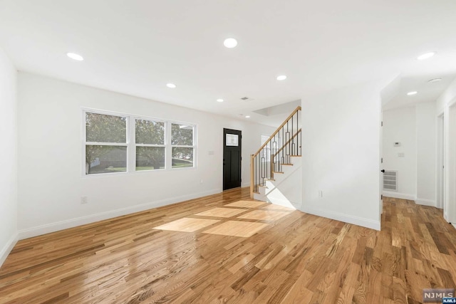 foyer entrance featuring light hardwood / wood-style flooring