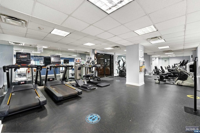 gym with a drop ceiling