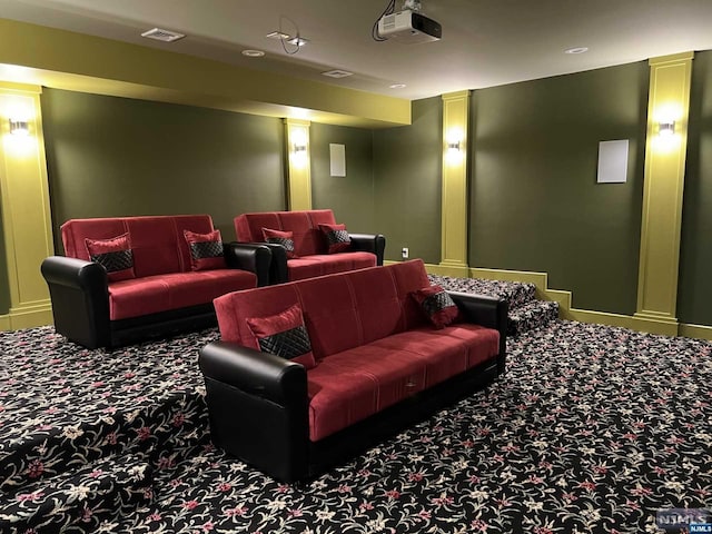 home theater room featuring carpet