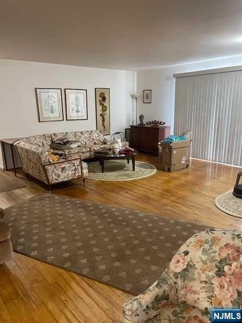 living room with hardwood / wood-style floors