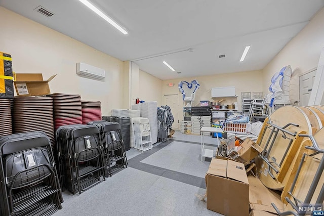 miscellaneous room featuring an AC wall unit