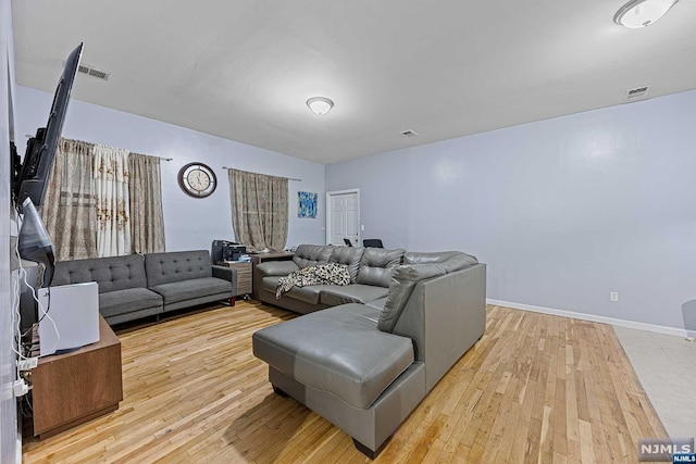 living room featuring light hardwood / wood-style floors