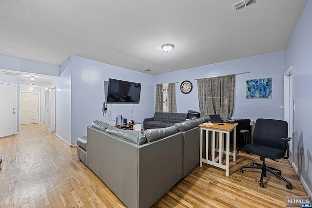 living room featuring light hardwood / wood-style floors