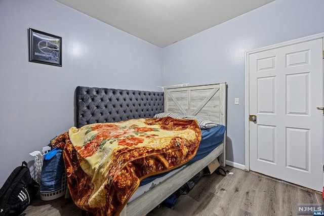 bedroom featuring light hardwood / wood-style flooring