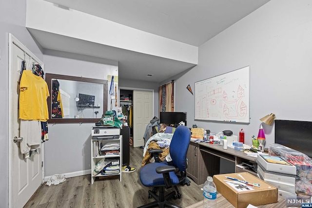 office space with hardwood / wood-style flooring