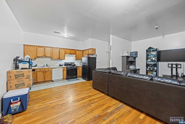 living room featuring light wood-type flooring