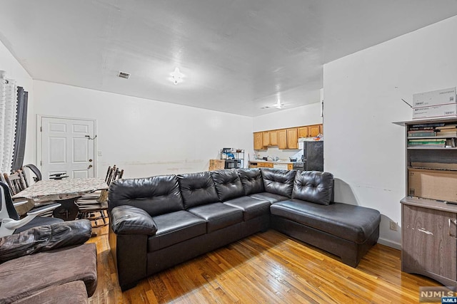 living room with light wood-type flooring