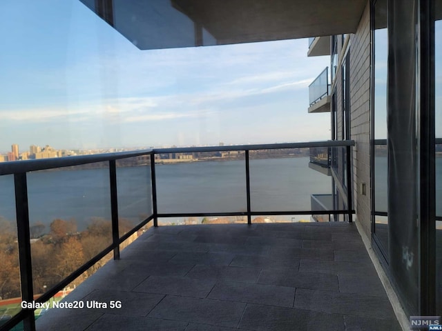 balcony featuring a city view