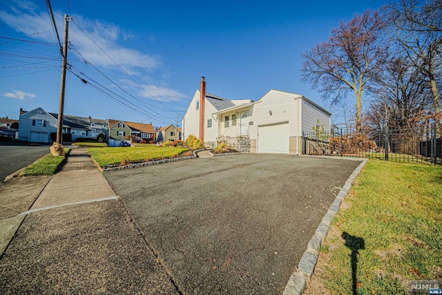 view of side of home featuring a yard