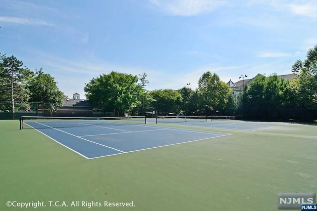 view of sport court featuring basketball court