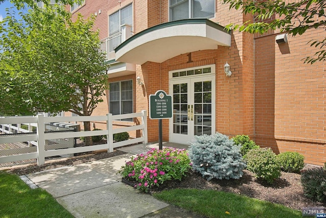 property entrance featuring french doors