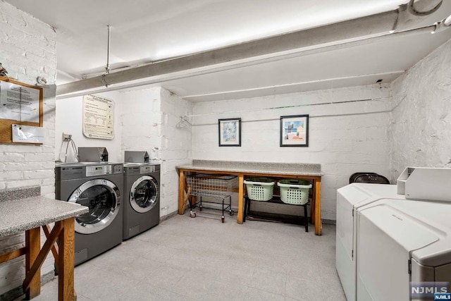 laundry area featuring washer and clothes dryer