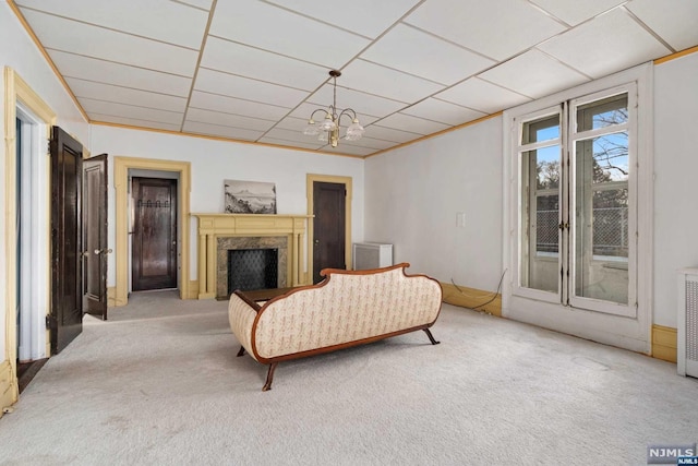 interior space featuring a notable chandelier and a premium fireplace