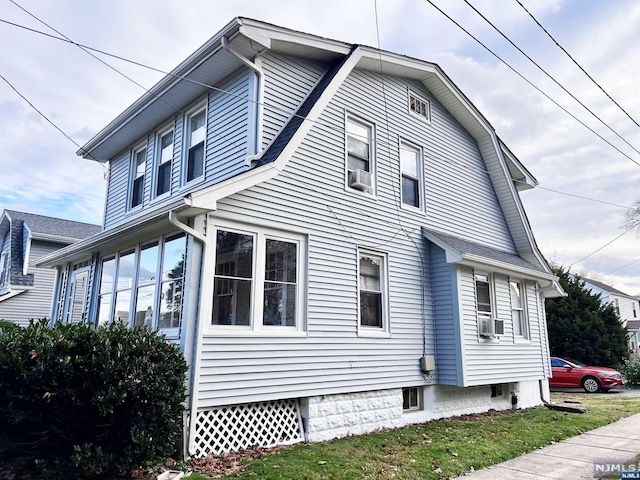 view of property exterior with cooling unit