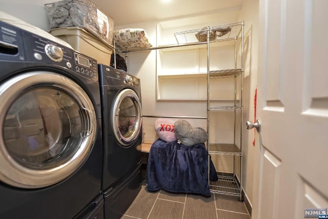 washroom featuring independent washer and dryer