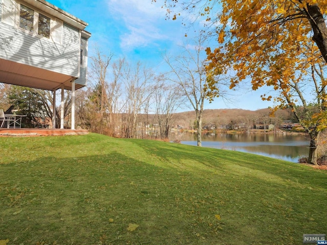 view of yard with a water view