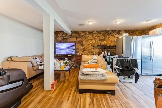 sitting room featuring light wood-type flooring