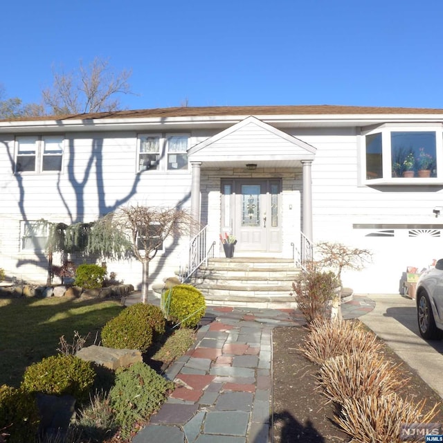 view of front of home featuring a garage