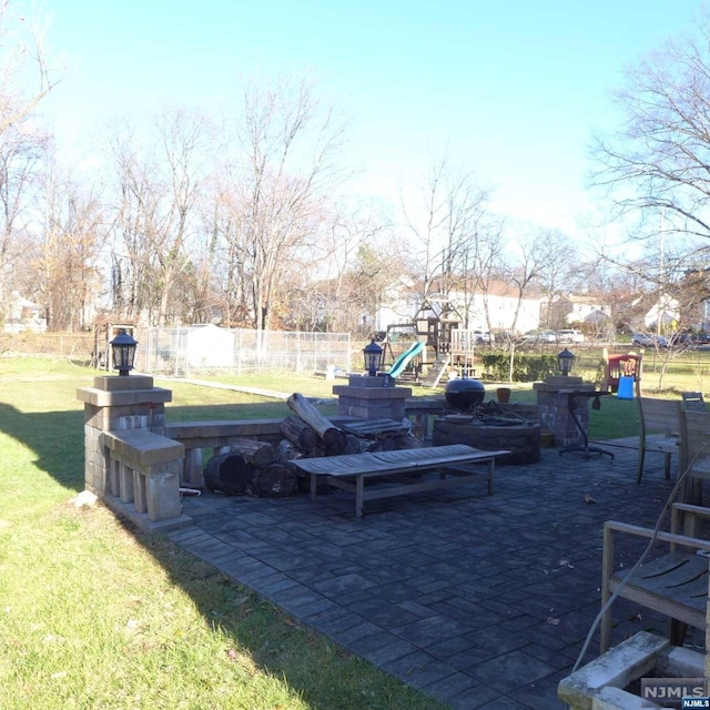 view of patio with a playground