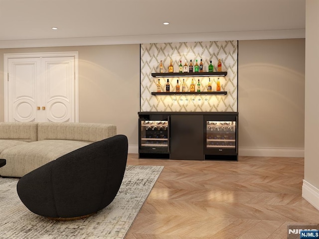 bar featuring light parquet flooring and beverage cooler