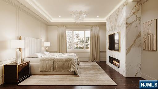 bedroom featuring ornamental molding and dark wood-type flooring