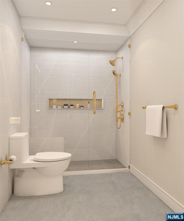 bathroom featuring toilet and tiled shower