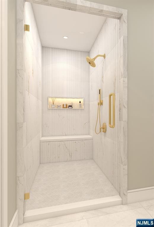 bathroom featuring an enclosed shower