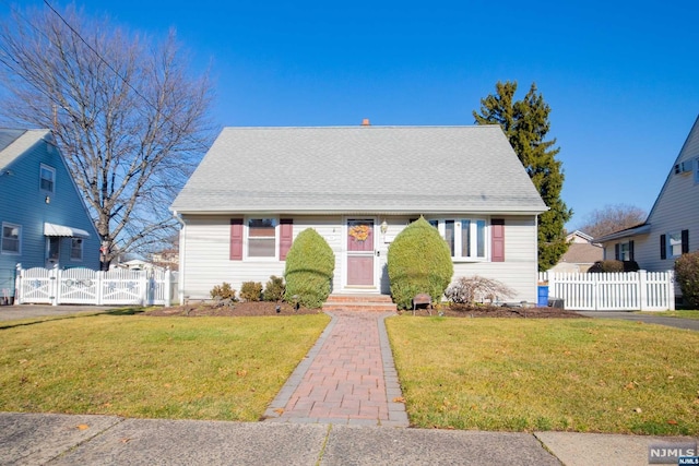 view of front of property with a front lawn