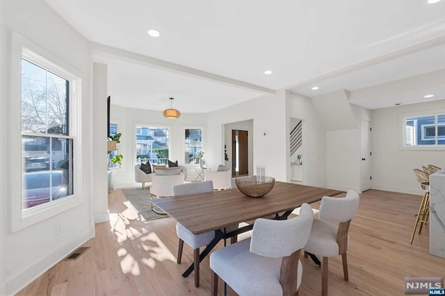 dining room featuring light wood-type flooring