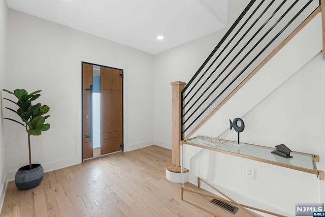 entryway featuring hardwood / wood-style floors