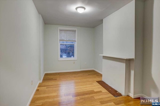 empty room with light wood-type flooring