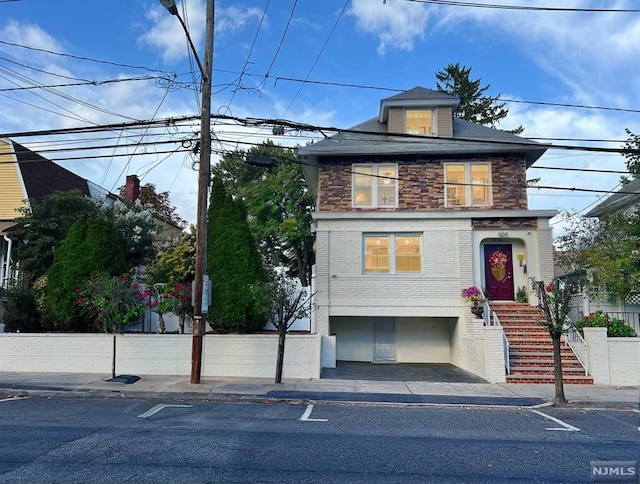 view of front of home featuring a garage