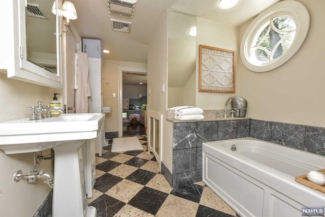 bathroom featuring a bathing tub