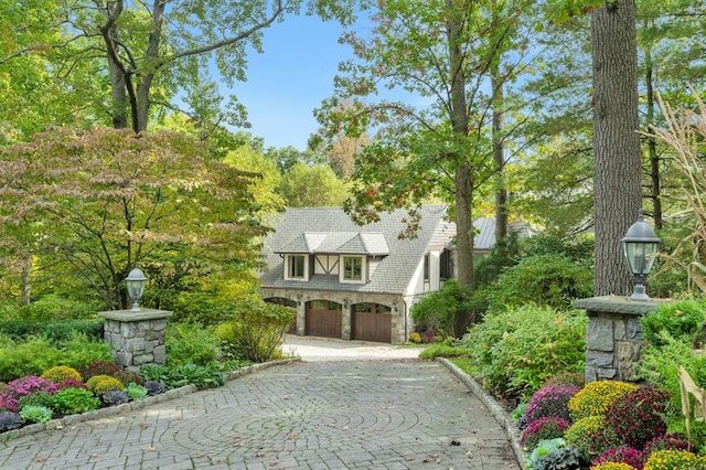 view of front of property featuring a garage