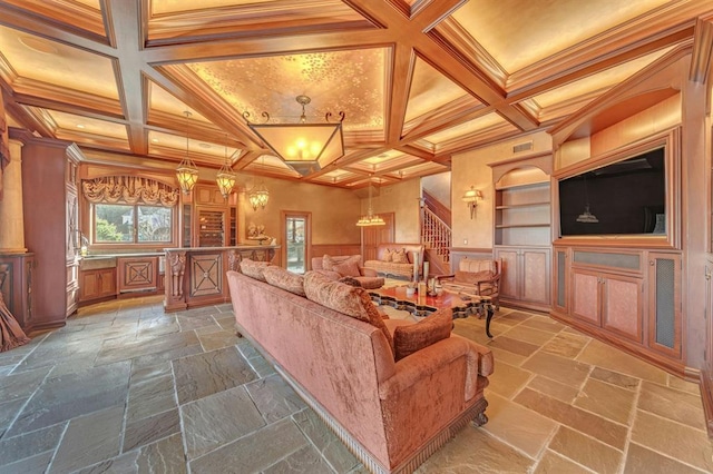 living room with built in shelves, crown molding, beamed ceiling, and coffered ceiling