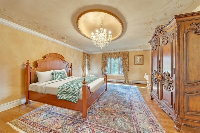 bedroom featuring an inviting chandelier, ornamental molding, and light wood-type flooring