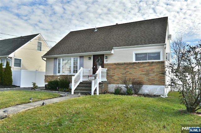 view of front of home with a front lawn