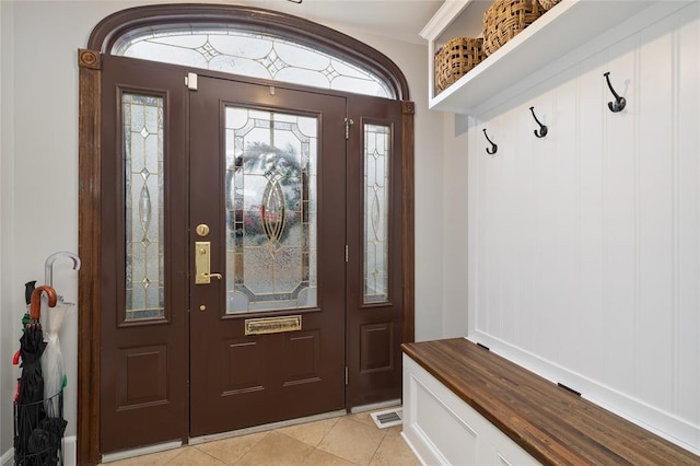 mudroom with light tile patterned floors