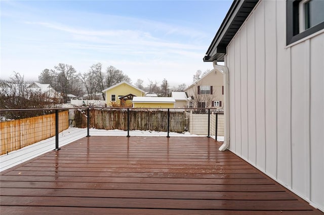 view of snow covered deck