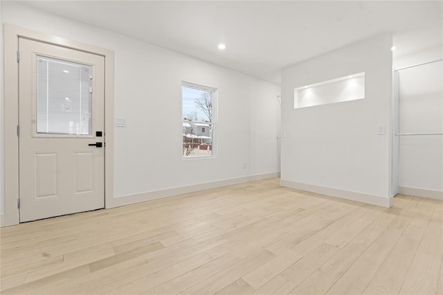 entrance foyer featuring light hardwood / wood-style floors