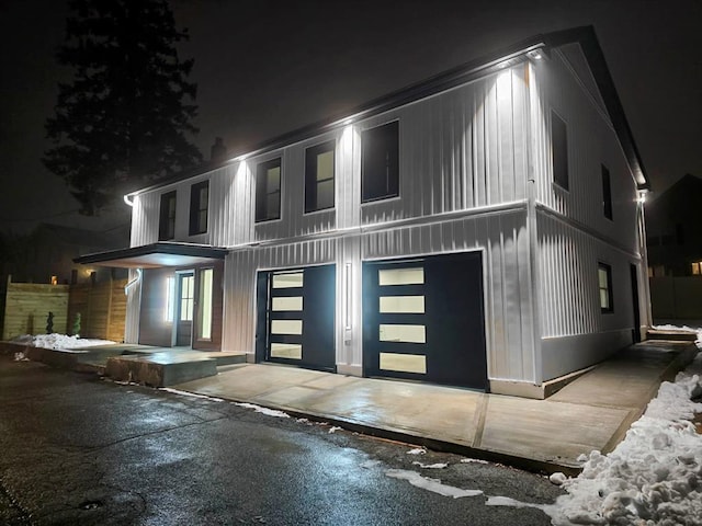 modern home featuring a garage