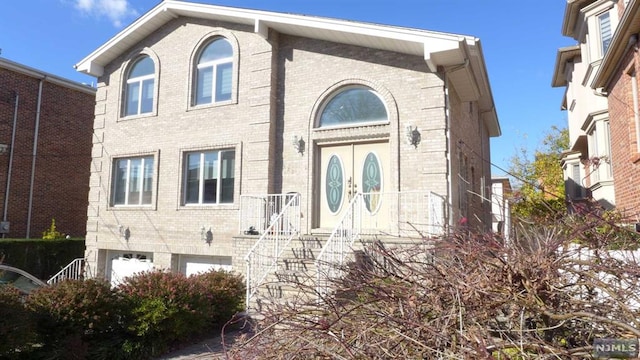 view of front of house with a garage