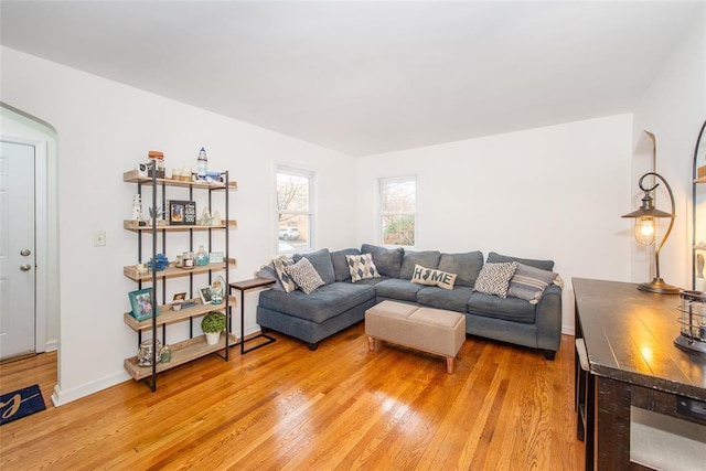 living room with light hardwood / wood-style floors