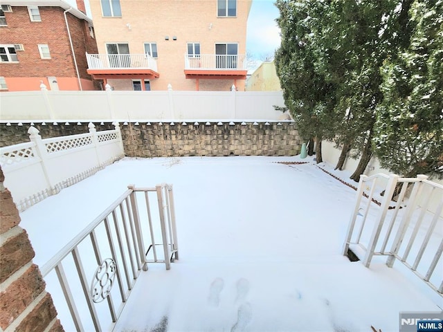 view of snowy yard